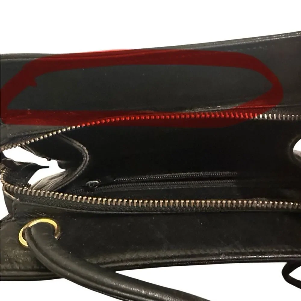 CHANEL Black Chevron Leather Shoulder Bag with Gold Accent